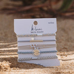 Wonder hair tie bracelet set in cream and blue with pearls and moon and stars charm, view 7