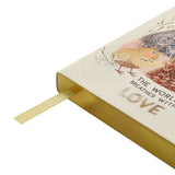 A5 vegan leather daily planner with gilded page edges and a ribbon marker, detail view