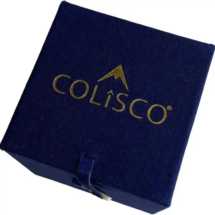 Closed navy velvet ornament gift box with a gold mountain logo