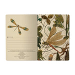 A5 ruled notebook with a green botanical cover design, detail view
