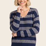 V-neck relaxed fit waffle texture striped sweater in light navy - front view
