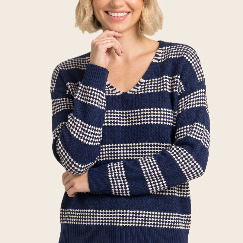 V-neck relaxed fit waffle texture striped sweater in light navy - front view
