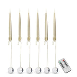 Six gold LED taper candles on hanging hooks with clear crystal ball weights and a remote