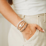 Glimmer hair tie bracelet set in soft pink with freshwater pearls and gold accents, view 3
