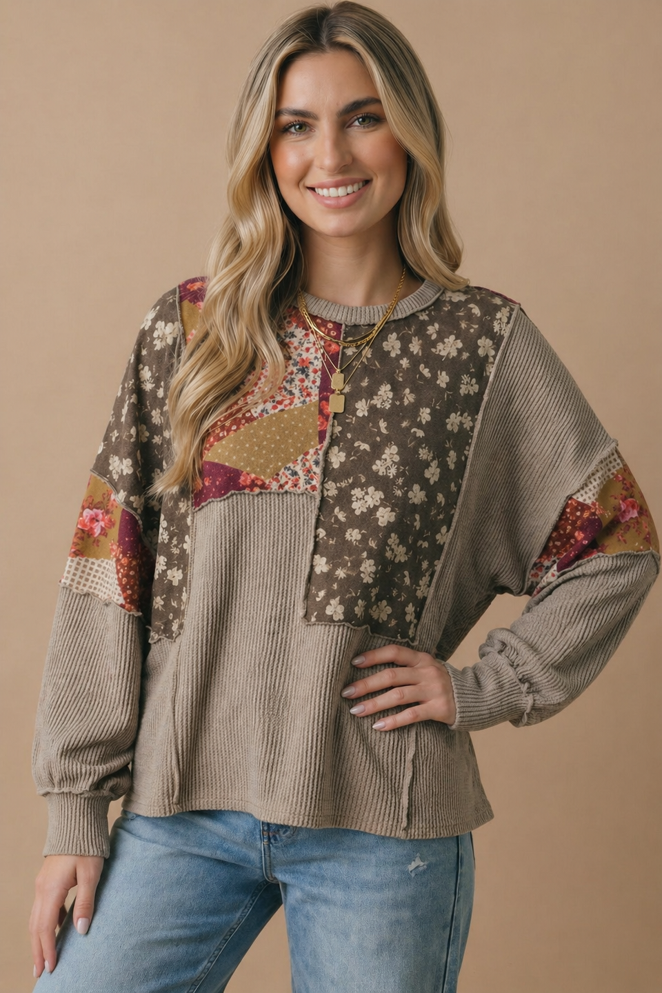 Blouson sleeve cuff detail on the floral patchwork knit top