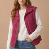 High Neck Snap Button Quilted Puffer Vest in Burgundy - hands in pockets