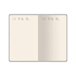 A5 vegan leather daily planner with gilded page edges and a ribbon marker, detail view