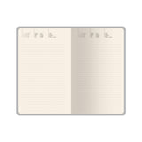 A5 vegan leather daily planner with gilded page edges and a ribbon marker, detail view