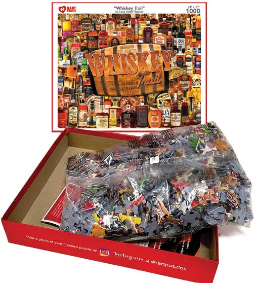 Whiskey Trail puzzle box opened with bagged pieces and the finished image on the lid