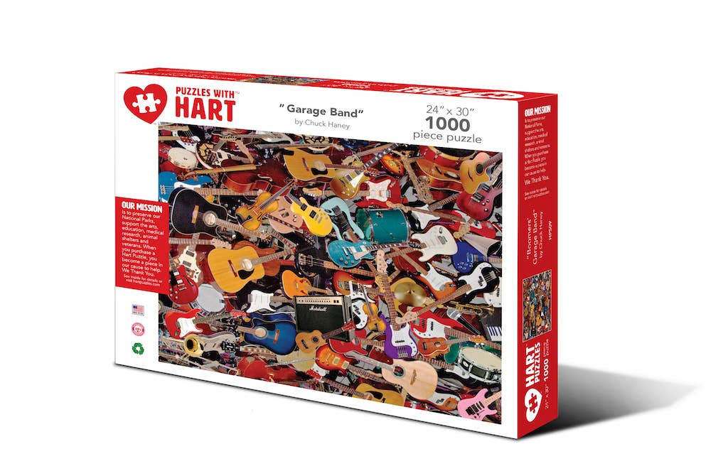 Garage Band 1,000-piece jigsaw puzzle box showing a collage of electric and acoustic guitars, basses and amplifiers