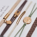Climb hair tie bracelet set in brown, cream and green with gold mountain charm, view 3