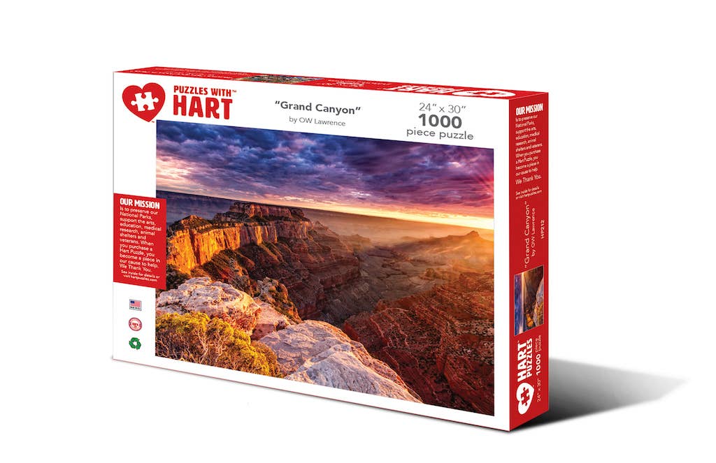 Grand Canyon 1,000-piece jigsaw puzzle box showing sunset light over the red rock cliffs of the Grand Canyon