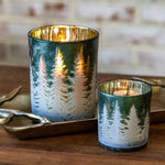Glass forest candle holders in two sizes with lit candles