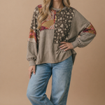 Back view of the floral patchwork wave rib knit top in taupe and mocha