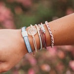 Bloom hair tie bracelet set in pink, maroon and green with pressed flowers, view 2