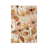 A5 ruled notebook with a blush and gold floral cover design, front cover