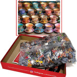 Garden Tea Cups puzzle box opened with bagged pieces and the finished image on the lid