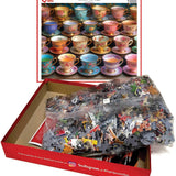 Garden Tea Cups puzzle box opened with bagged pieces and the finished image on the lid