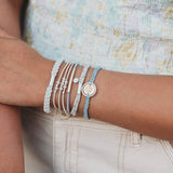 Wonder hair tie bracelet set in cream and blue with pearls and moon and stars charm, view 6