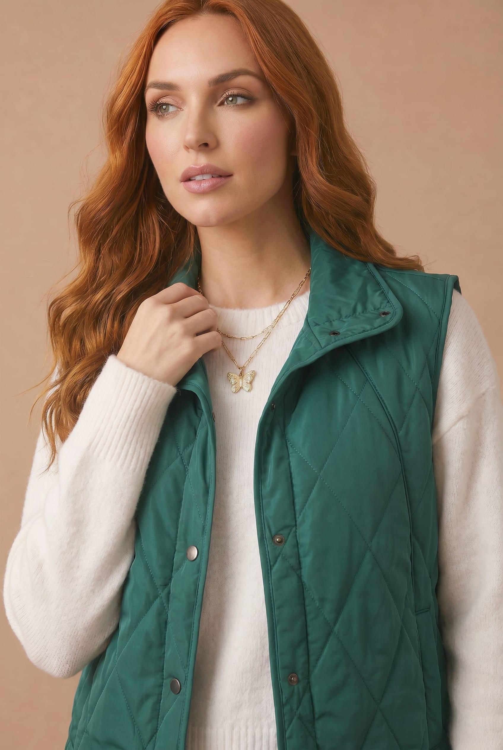 High Neck Snap Button Quilted Puffer Vest in Hunter Green - front view
