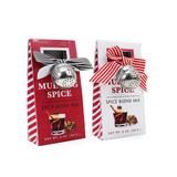 Red and white mulling spice blend boxes tied with striped bows and silver tea ball infusers