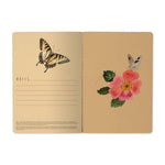 A5 soft-touch notebook with a butterfly and peony cover design, interior ruled pages