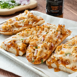 BBQ chicken flatbreads with melted cheese, red onion and cilantro made with Sweet Heat Grill & Wing Sauce