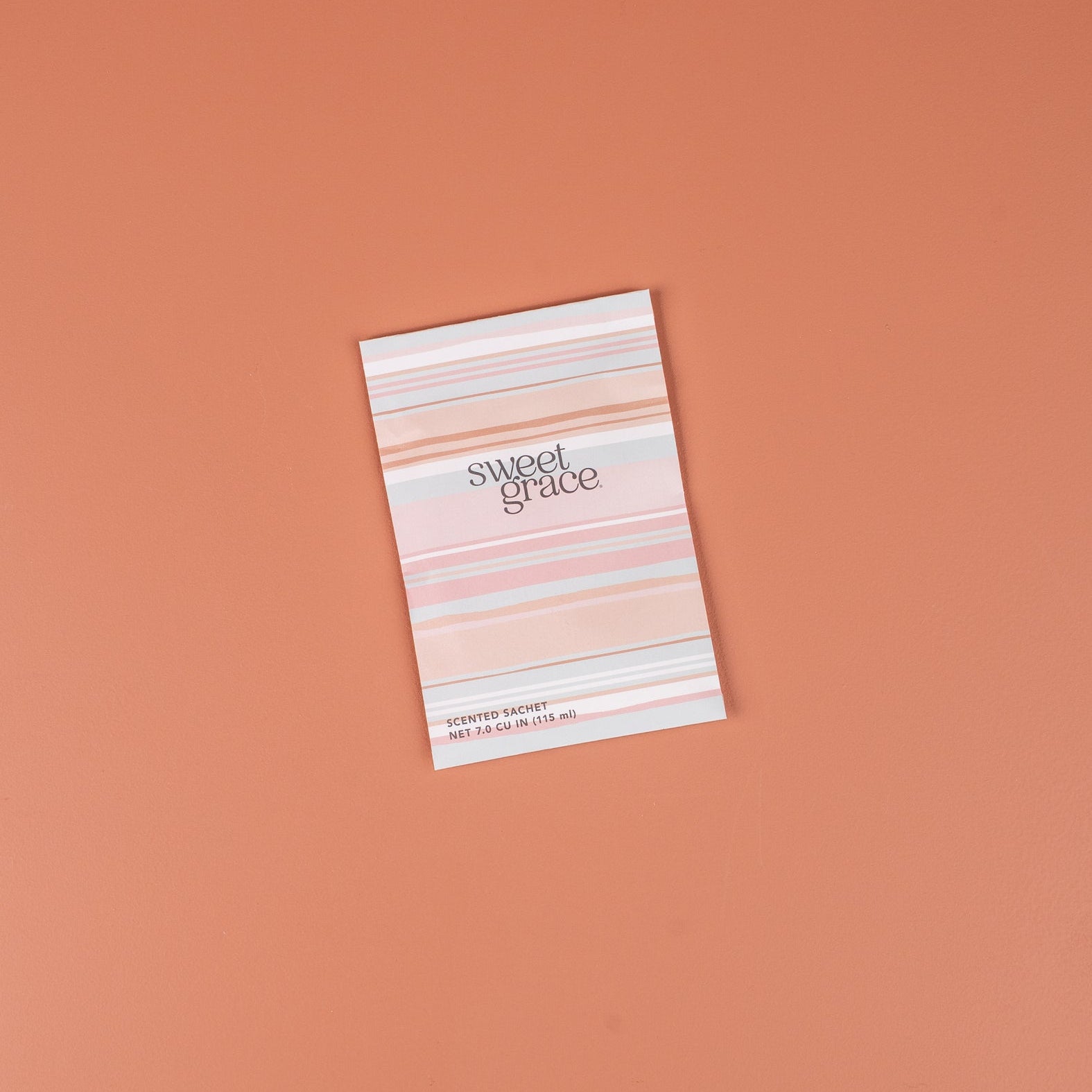 Bridgewater Sweet Grace mod stripe sachet lying flat on a peach surface
