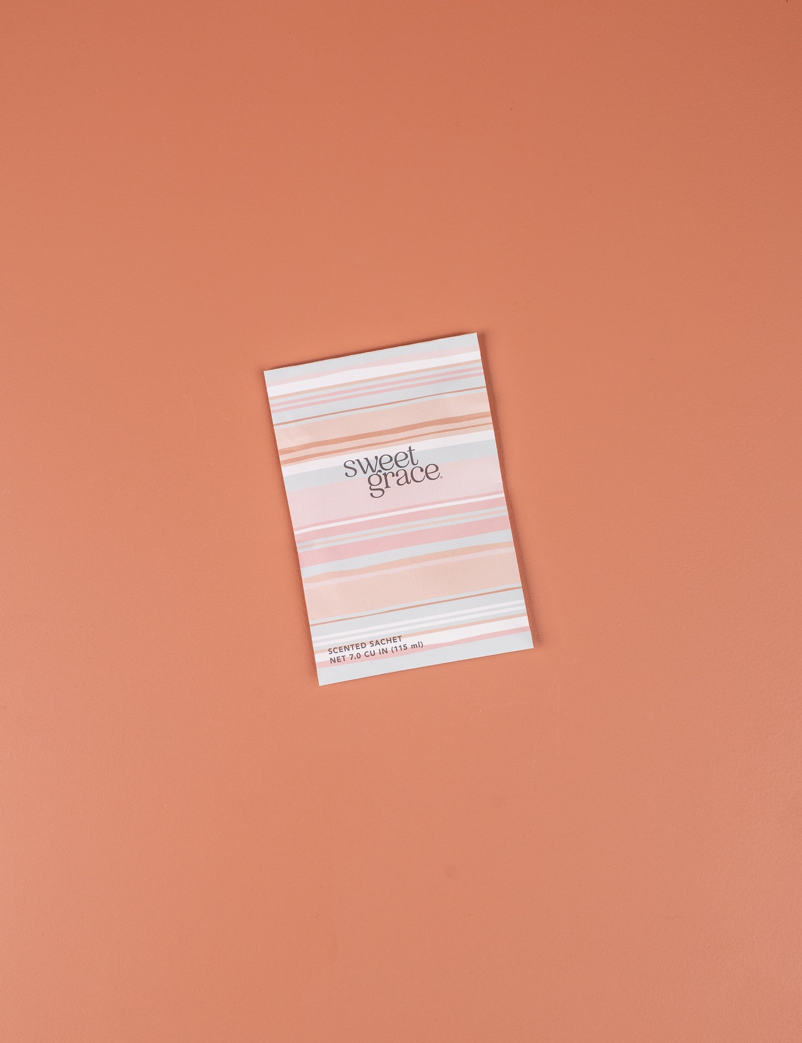 Bridgewater Sweet Grace mod stripe sachet lying flat on a peach surface