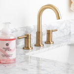 Bridgewater Sweet Grace foaming hand soap on a marble bathroom countertop beside a brass faucet