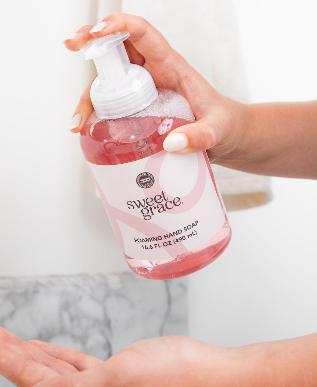 Bridgewater Sweet Grace foaming hand soap being pumped into a palm