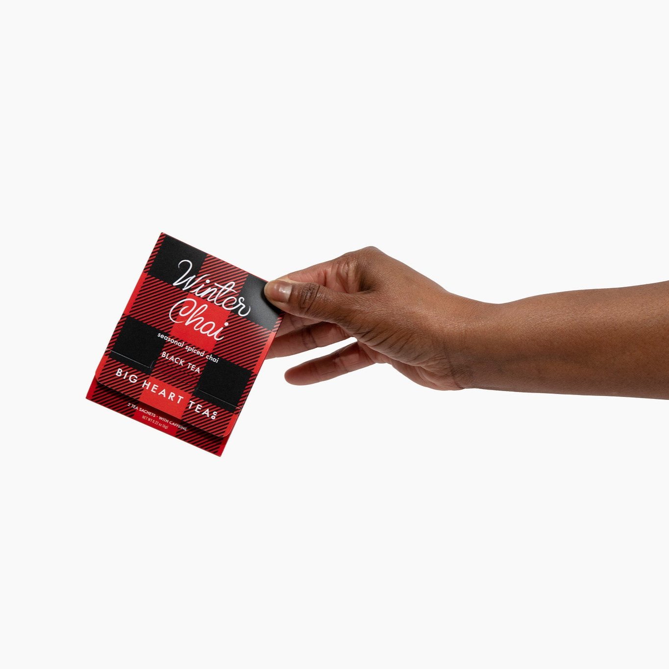 Winter Chai tea box held in an open hand