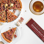 Bourbon Pecan Pie Chocolate Bar styled with pecan pie