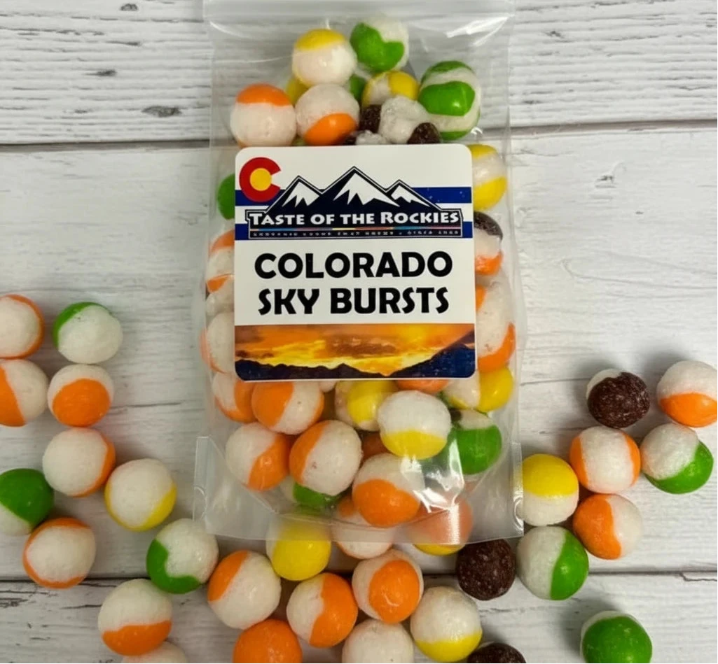 Packaging of Colorado Sky Bursts freeze dried candy by Taste of the Rockies, showing colorful candies through the transparent plastic.