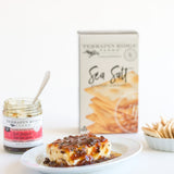 Sea Salt Crackers served with cheese topped with hot pepper bacon jam