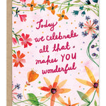 Celebrate All That Makes You Wonderful Birthday Card — front: a soft pink card framed in painted wildflowers with hand-lettered "today we celebrate all that makes you wonderful"