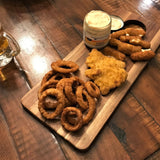 Platter of onion rings, chicken and mozzarella sticks served with Hoppin' Jalapeño Dip