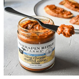 Bleu Cheese Stuffed Olive Dip served on toasted crostini