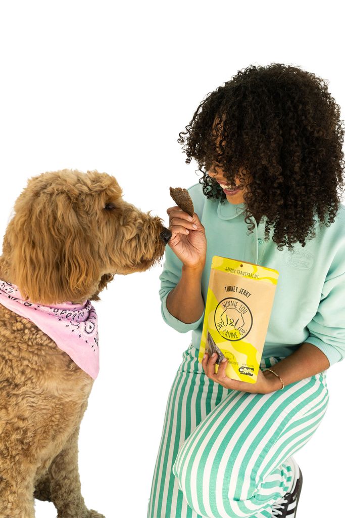 Dog with Winnie Lou Turkey Jerky treats