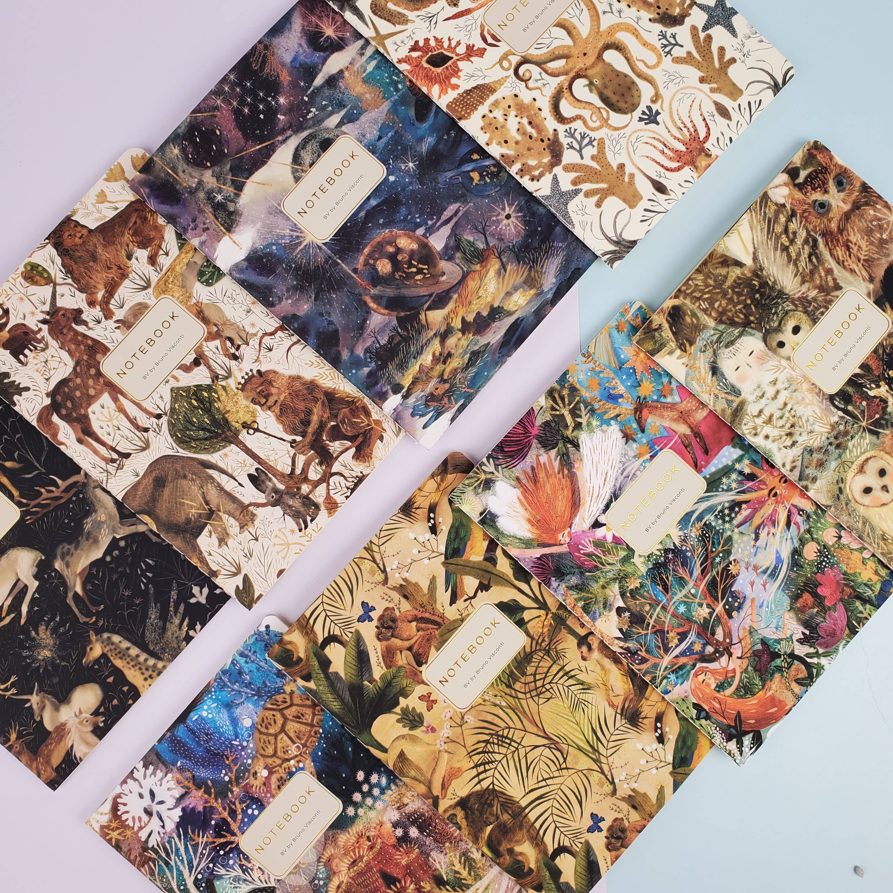 A5 ruled notebook with a galaxy and starfield cover design, interior ruled pages