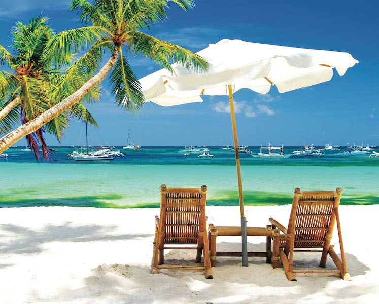 Completed The Perfect Beach 1,000-piece jigsaw puzzle: two beach chairs under a white umbrella on a tropical beach with turquoise water