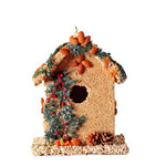 Juniper seed-covered birdhouse on a white background