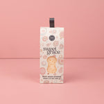 Sweet Grace Body Wash Sponge standing upright against a pink background