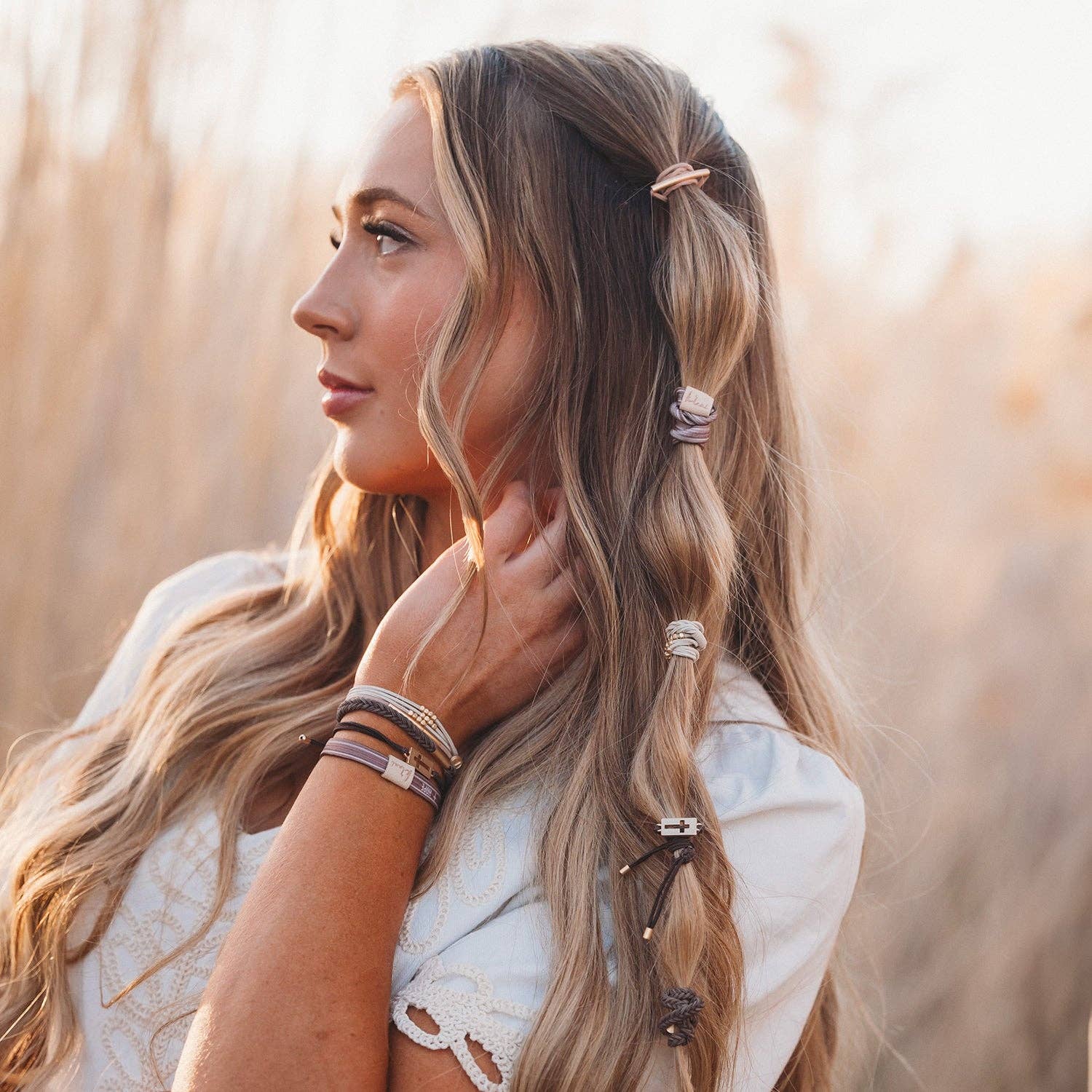 Faith hair tie bracelet set in tan and brown with gold beads and cross charm, view 2