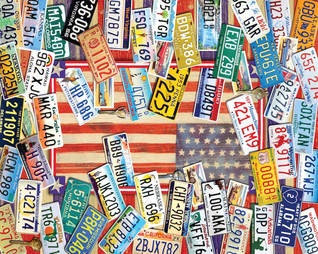 Completed State Plates of the USA 1,000-piece jigsaw puzzle: a collage of state license plates from across the USA around an American flag