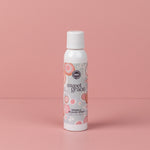 Sweet Grace Wrinkle Release Spray bottle standing on a pink surface