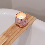 Bridgewater Sweet Grace faceted pink candle lit on a wooden bath tray