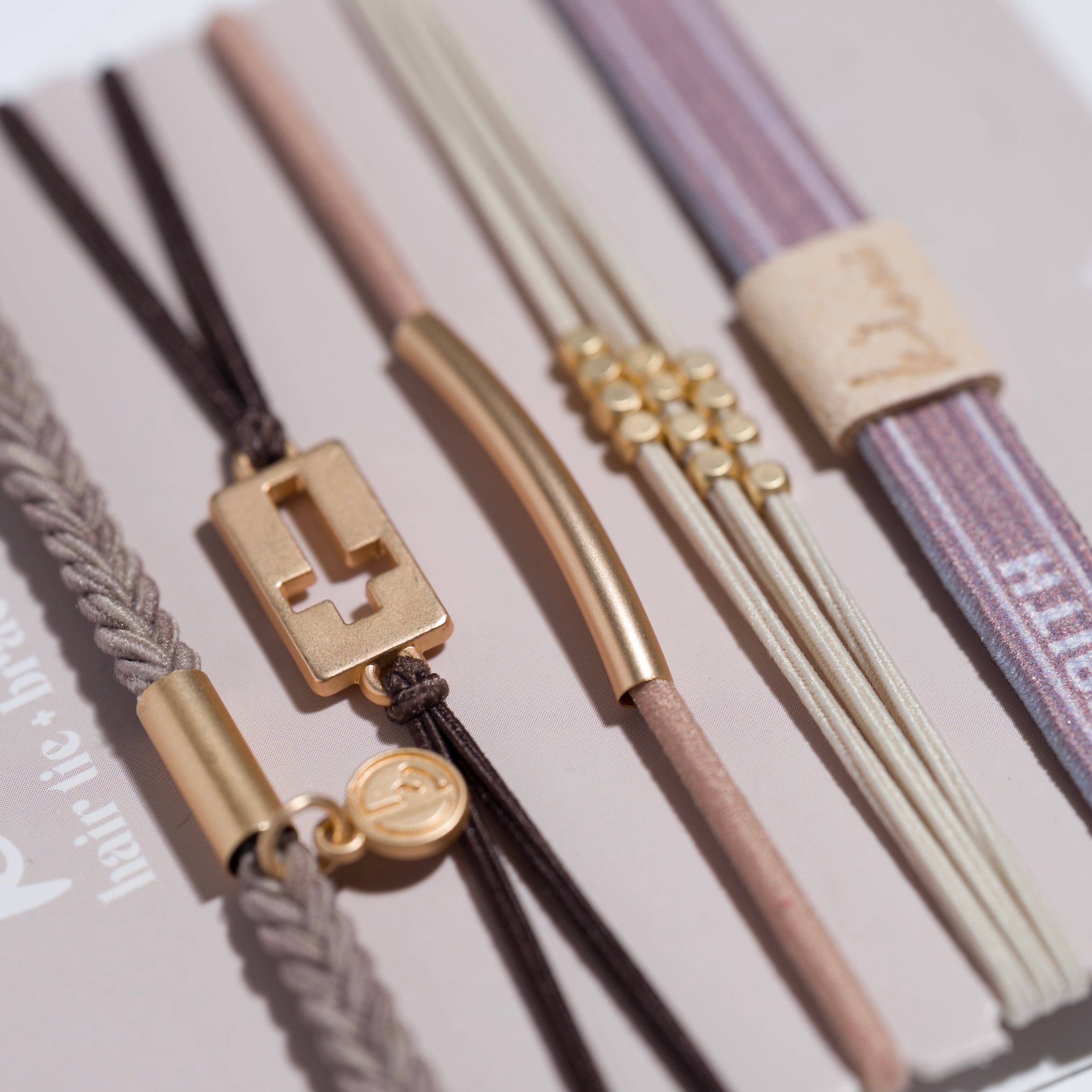 Faith hair tie bracelet set in tan and brown with gold beads and cross charm, view 3