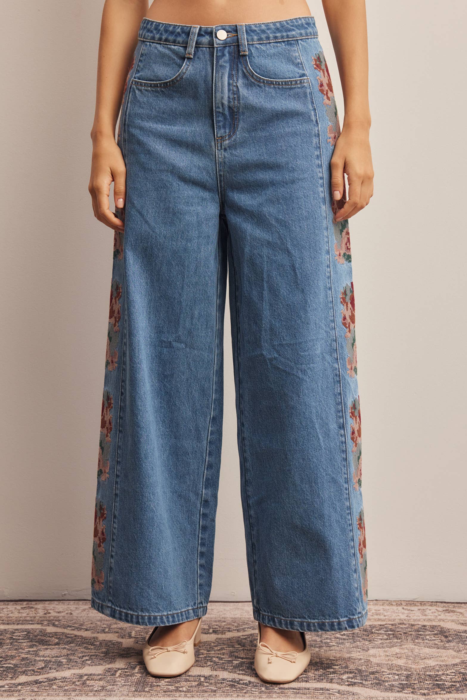 Floral side panel wide-leg denim jeans in washed denim - front view