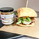 Ciabatta sandwich with arugula, melted cheese and Balsamic Onion Jam